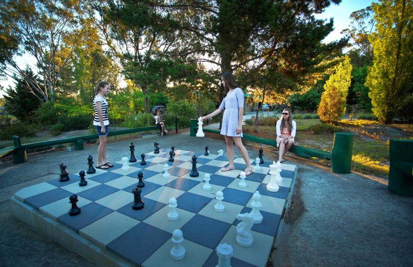 Challenge the kids to a game of chess or checkers. Or even teach them to play.